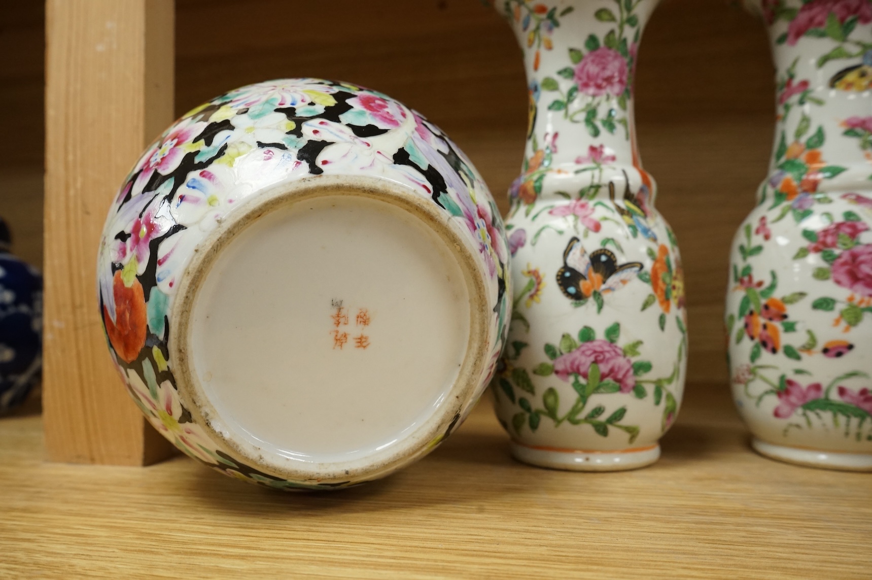 A Chinese 'Thousand Flower' jar, two famille rose vases, and a Republic period jar and cover, largest 19cm high